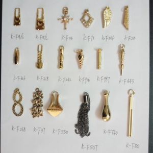 廣州紐扣供應箱包服飾拉頭 拉片 拉牌